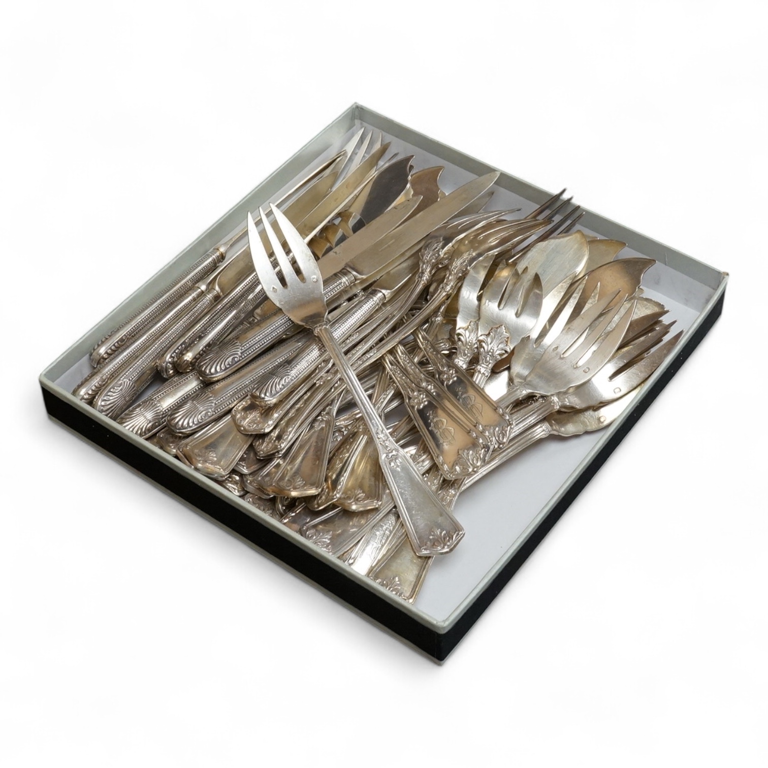 Eighteen pairs of early 20th century French 950 standard white metal fish eaters by Olier & Caron, together with a set of twelve French silver dessert knives(loaded handles) a French white metal table fork and two French